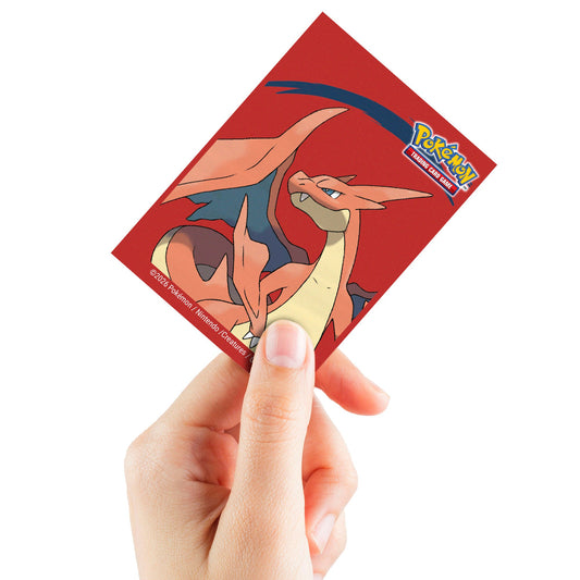 Ultra PRO Mega Charizard Y Deck Protector Sleeves — sleeved card in hand